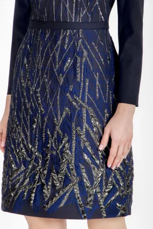 Blue evening dress with metallic details