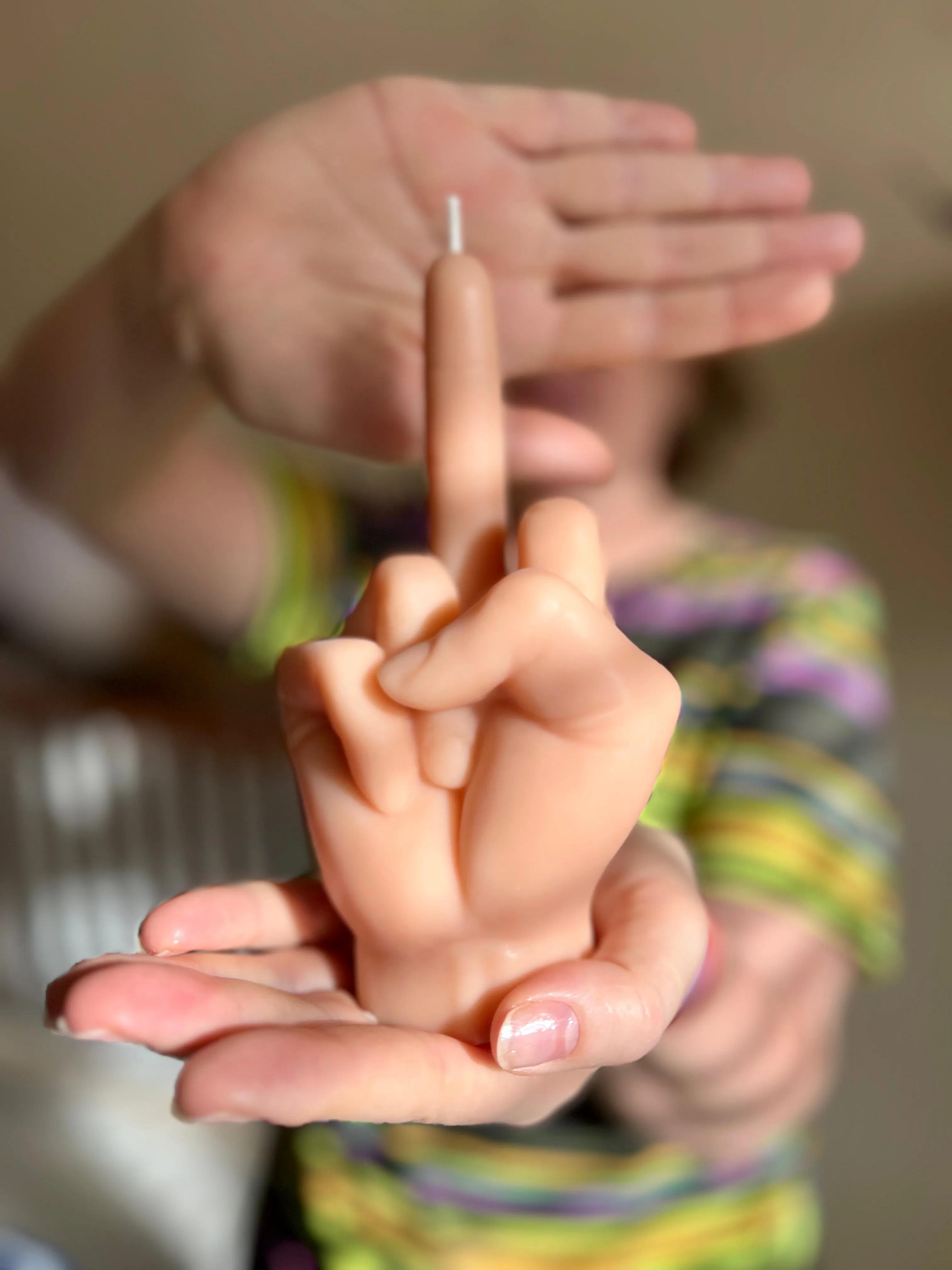 Middle Finger Candle  FLIP OFF sign wax art, protest, defiance, expression, humor, statement, controversy, bold, irreverent, dissent, unconventional art